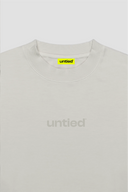 UNTIED® THE ENTRY COLLECTION SS26 LIGHT GRAY T-SHIRT