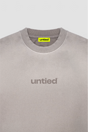 UNTIED® THE ENTRY COLLECTION SS26 PYRITE SUN FADED T-SHIRT