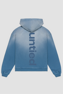 UNTIED® THE ENTRY COLLECTION SS26 ENSIGN BLUE SUN FADED HOODIE
